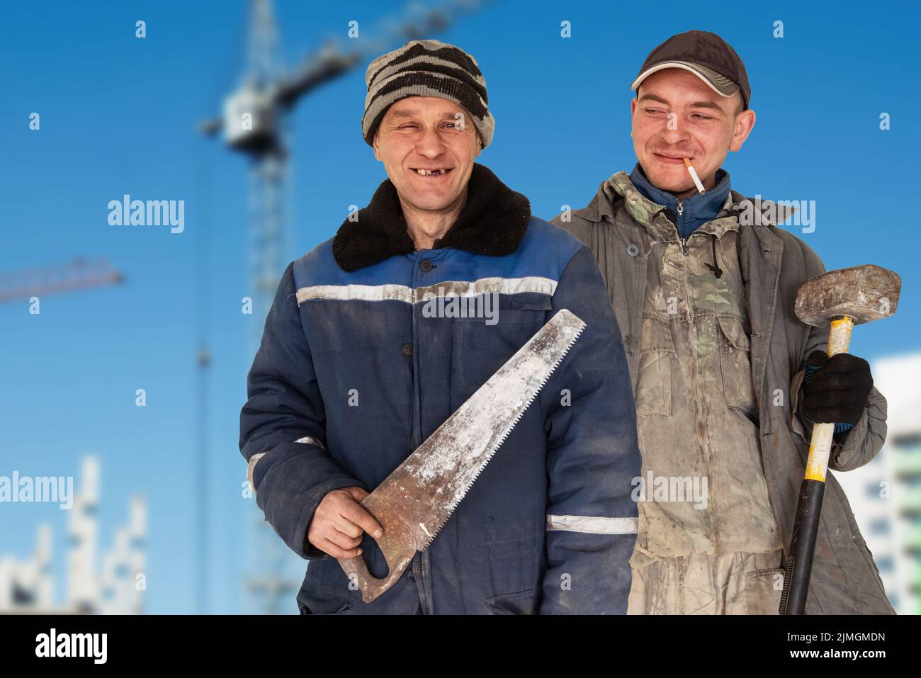 Two bad unskilled builder workers Stock Photo