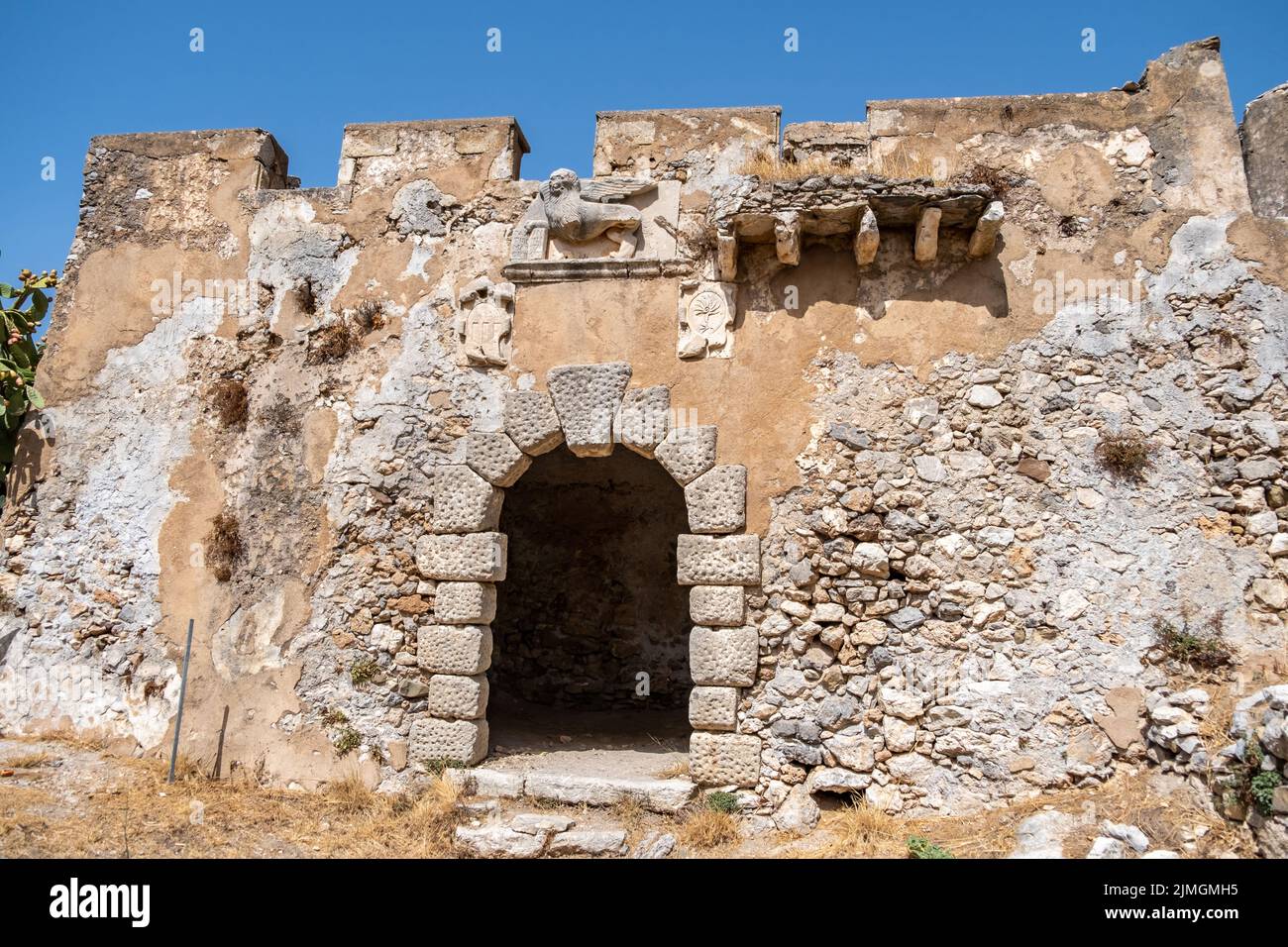 Kythera Kastro of Milopotamos Kato Chora Ionian islands, Greece. Old stonewall Venetian castle, ruins of building with arch and crenel, monument at Ki Stock Photo