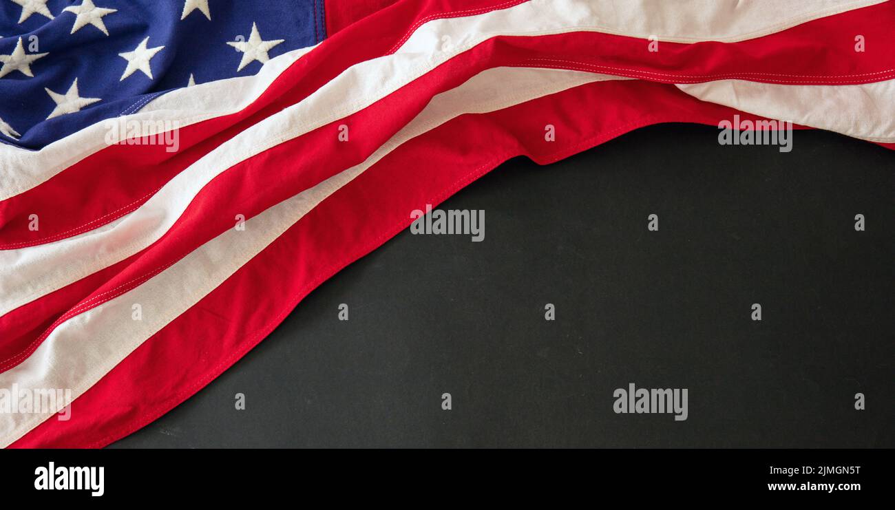 USA Flag on black background, top view. National American holiday celebration template, copy space. Stock Photo