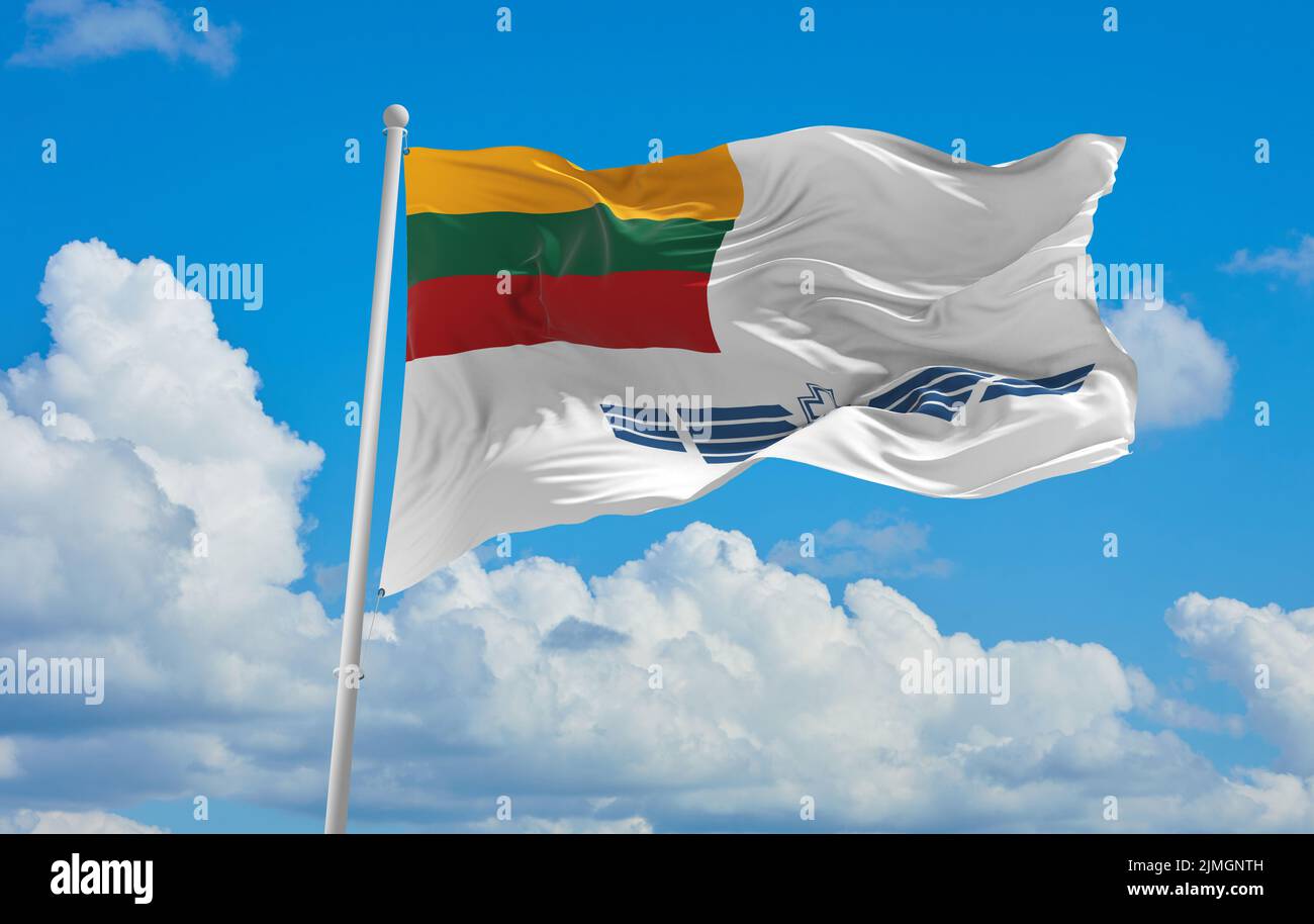 official flag of Air Force Ensign lithuania at cloudy sky background on sunset, panoramic view. lithuanian travel and patriot concept. copy space for Stock Photo