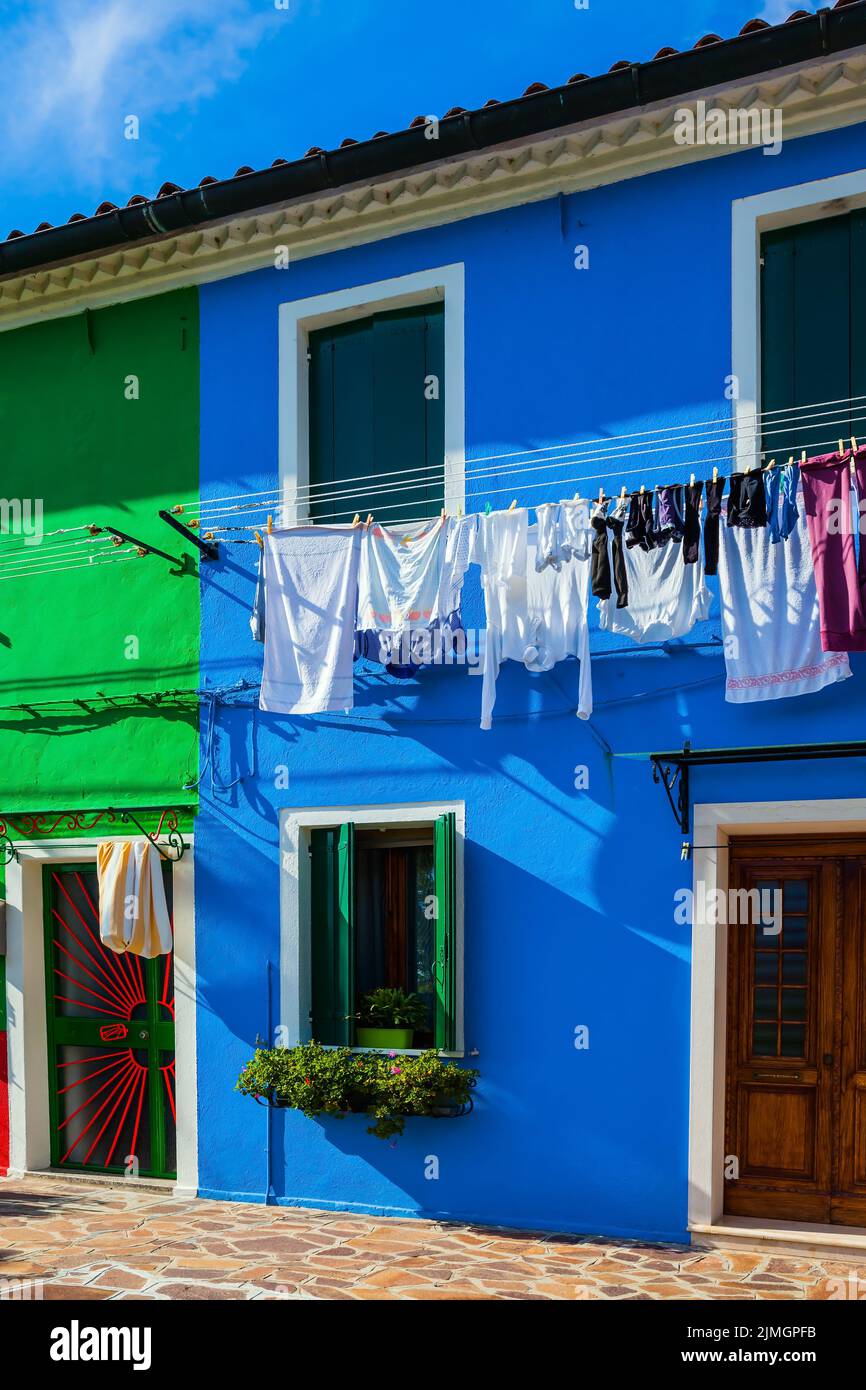 Colorful linens are dried on the balconies Stock Photo