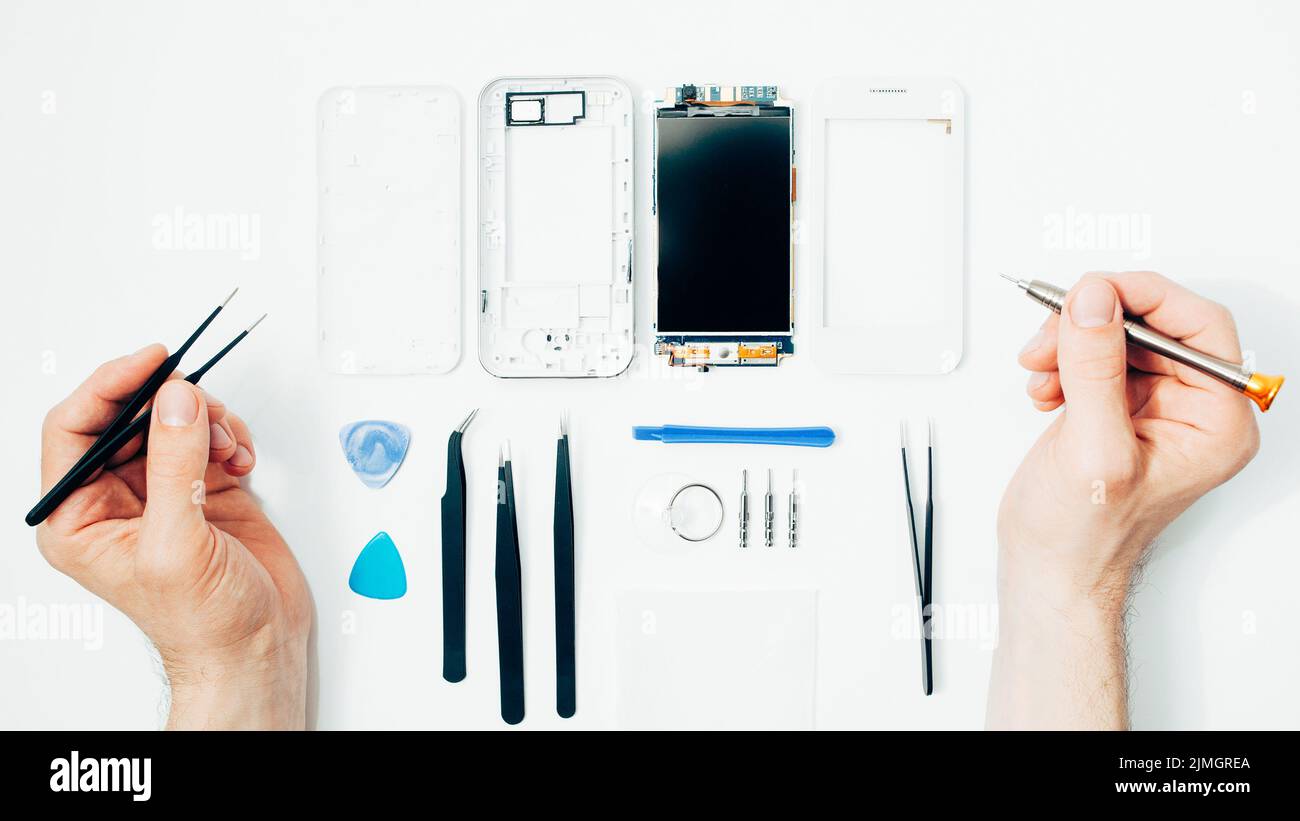 mobile phone repair parts replacing broken screen Stock Photo Alamy