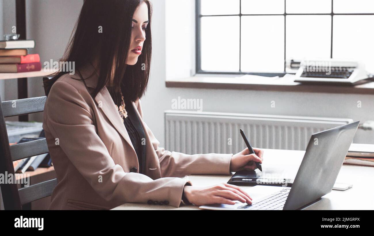female designer editing artwork graphic tablet Stock Photo