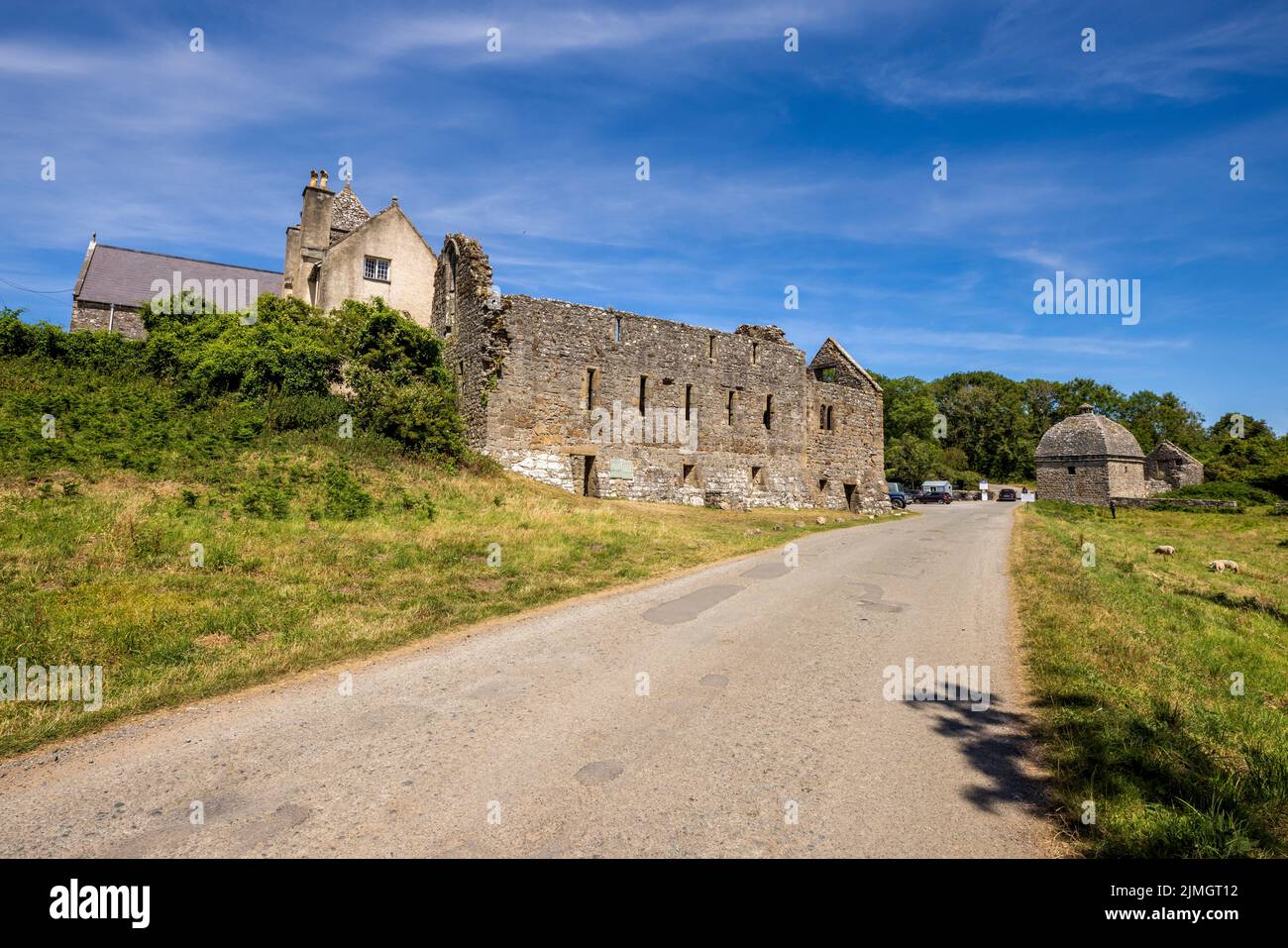Penmon Priory and Dovecote at Penmon Point, Isle of Anglesey, Noth Wales Stock Photo