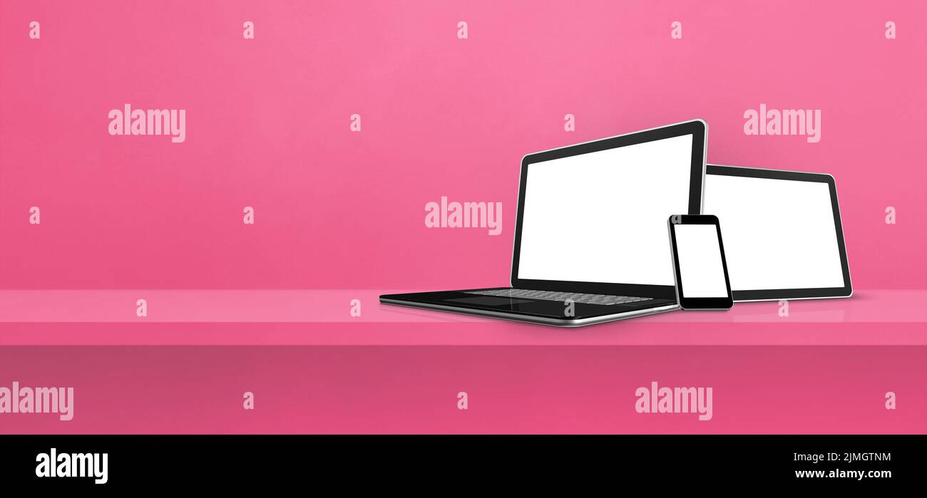 Laptop, mobile phone and digital tablet pc on pink wall shelf. Banner background Stock Photo