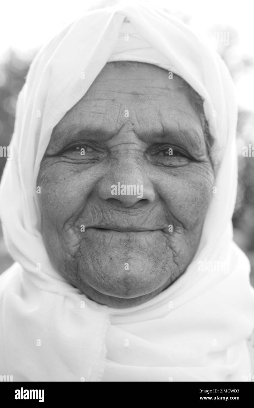 Portrait of Berber old woman in traditional dress Stock Photo