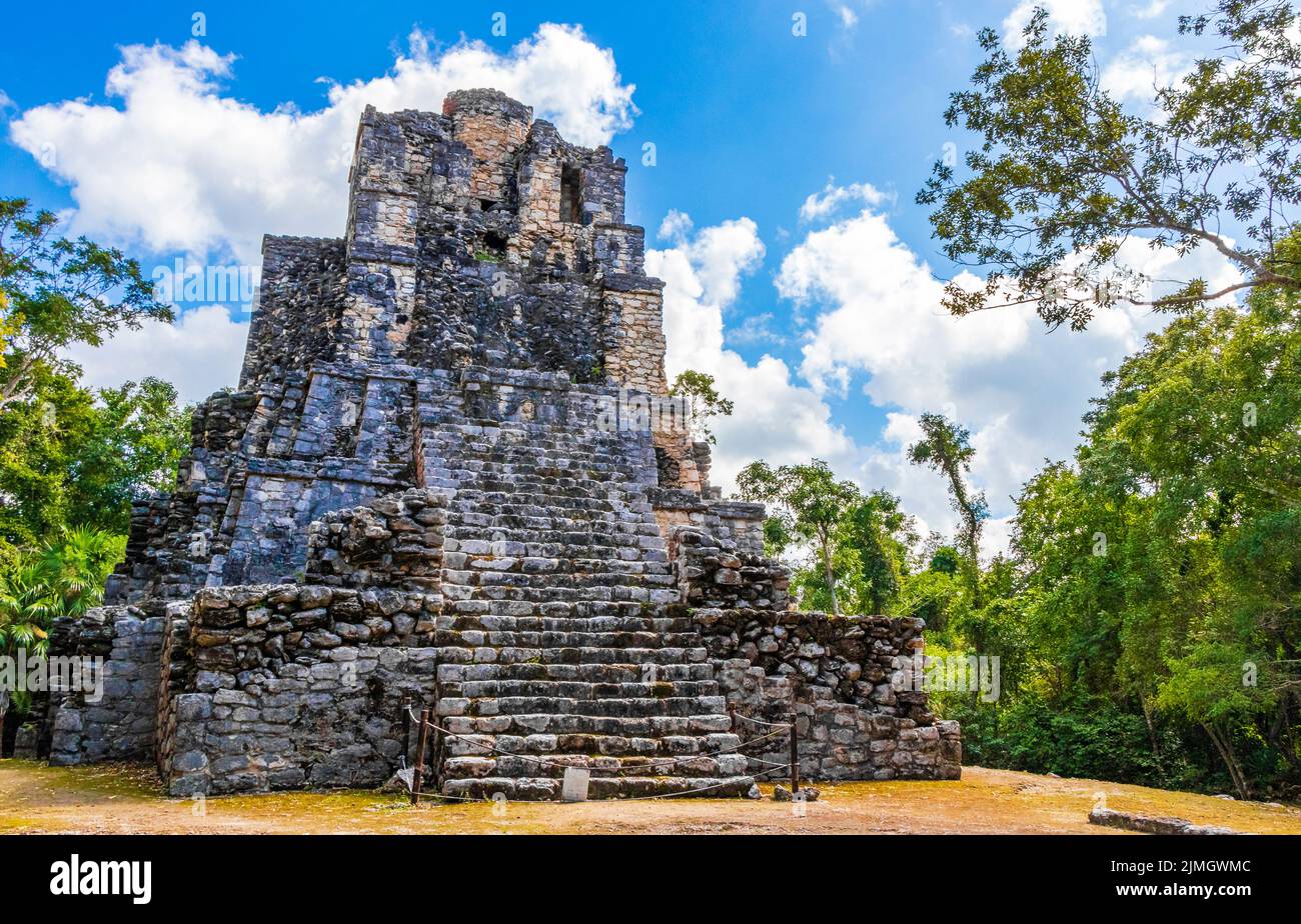 Ancient Mayan site with temple ruins pyramids artifacts Muyil Mexico. Stock Photo