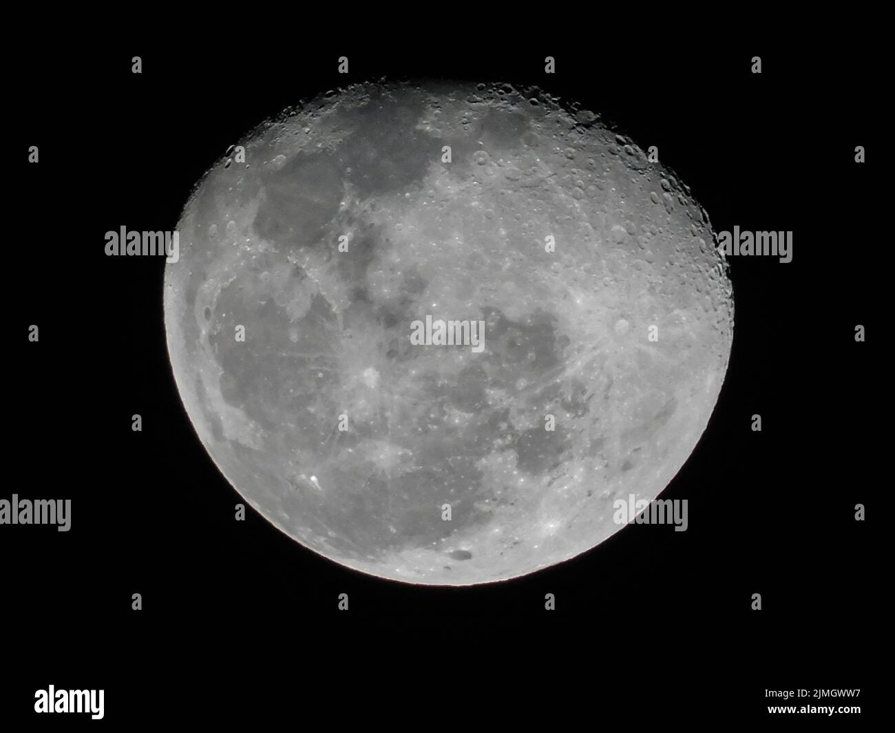 A closeup shot of the full Moon against a black sky Stock Photo - Alamy