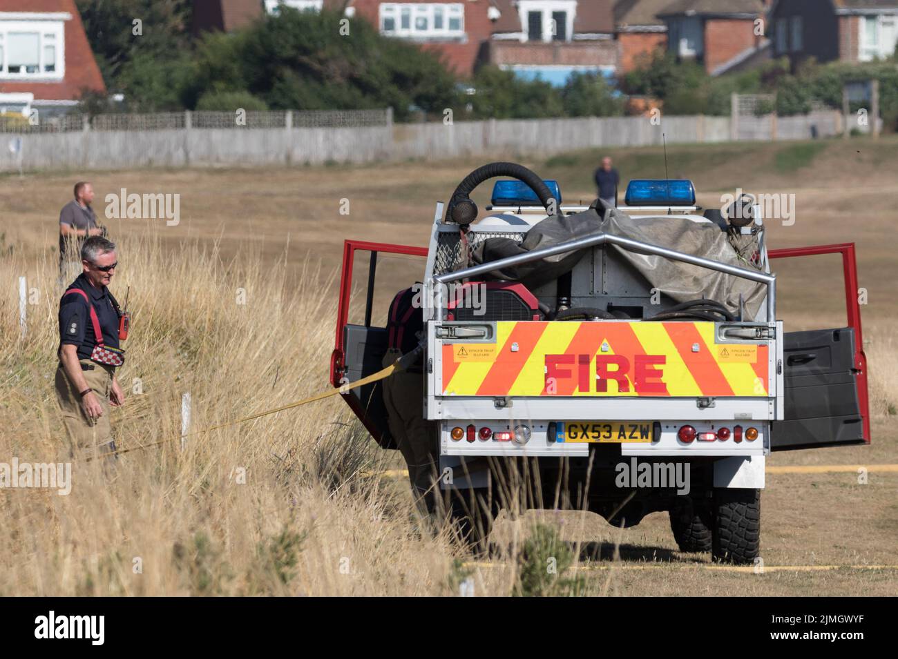 Seaford, East Sussex, UK. th August 2022. Emergency services respond to fire on heathland around the Seaford head golf course, cause currently unknown. Credit: Newspics UK South/Alamy Live News Stock Photo