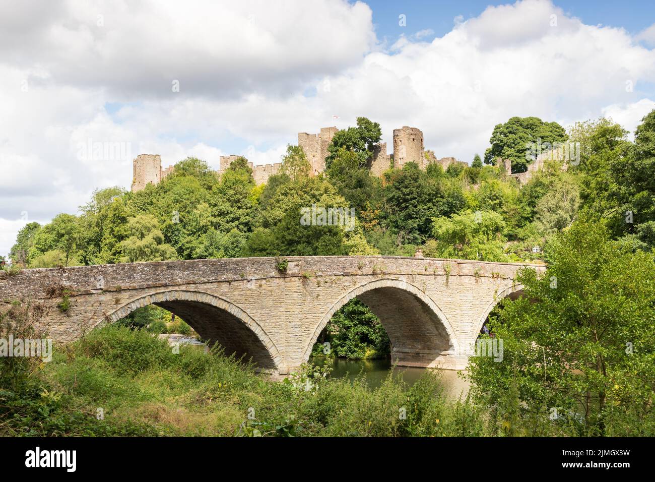 Dinham Bridge overr the River Teme in Ludlow, Shropshire UK with Ludlow castle behind Stock Photo