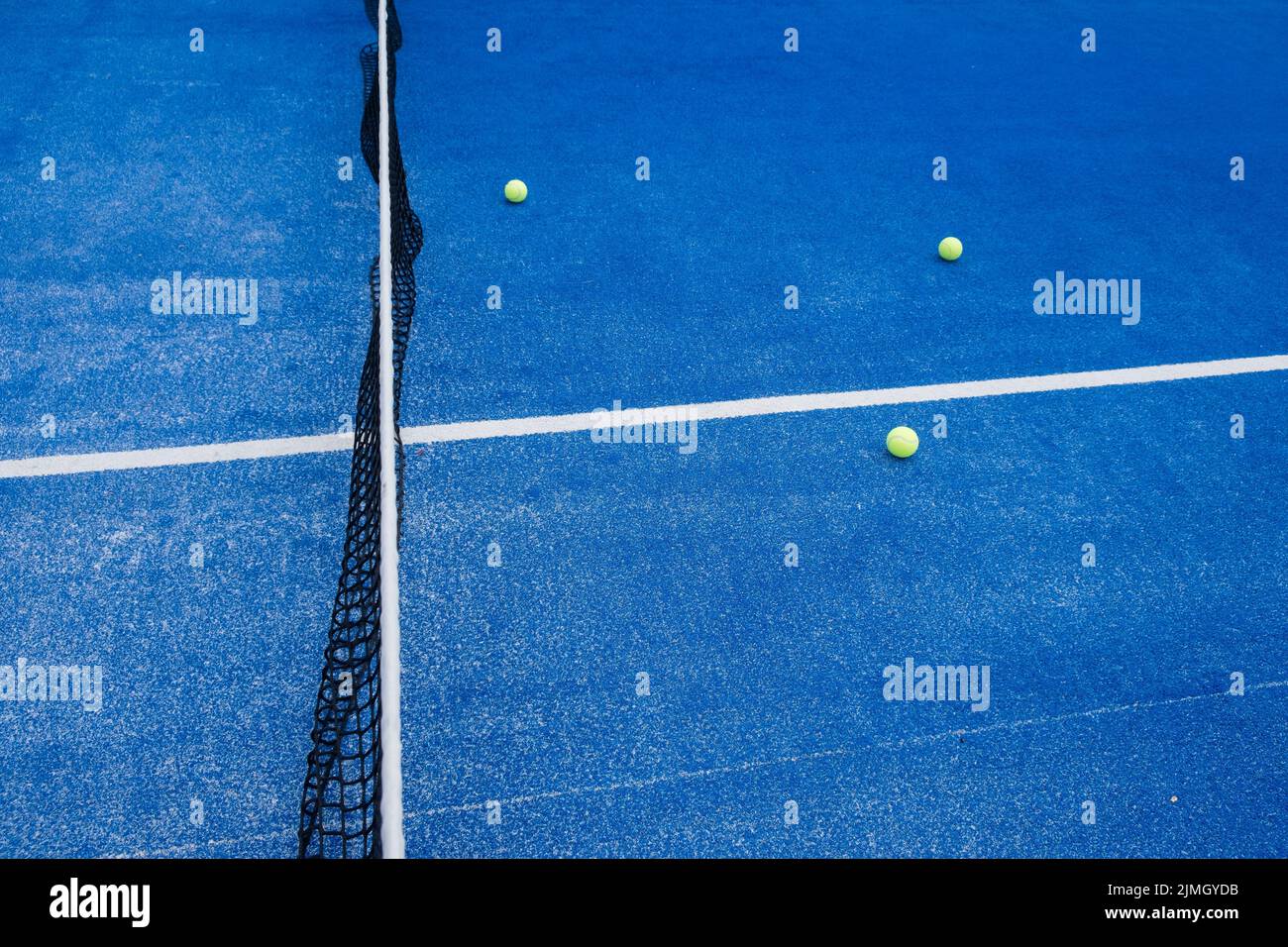 Paddle tennis balls on a paddle tennis court for background Stock Photo