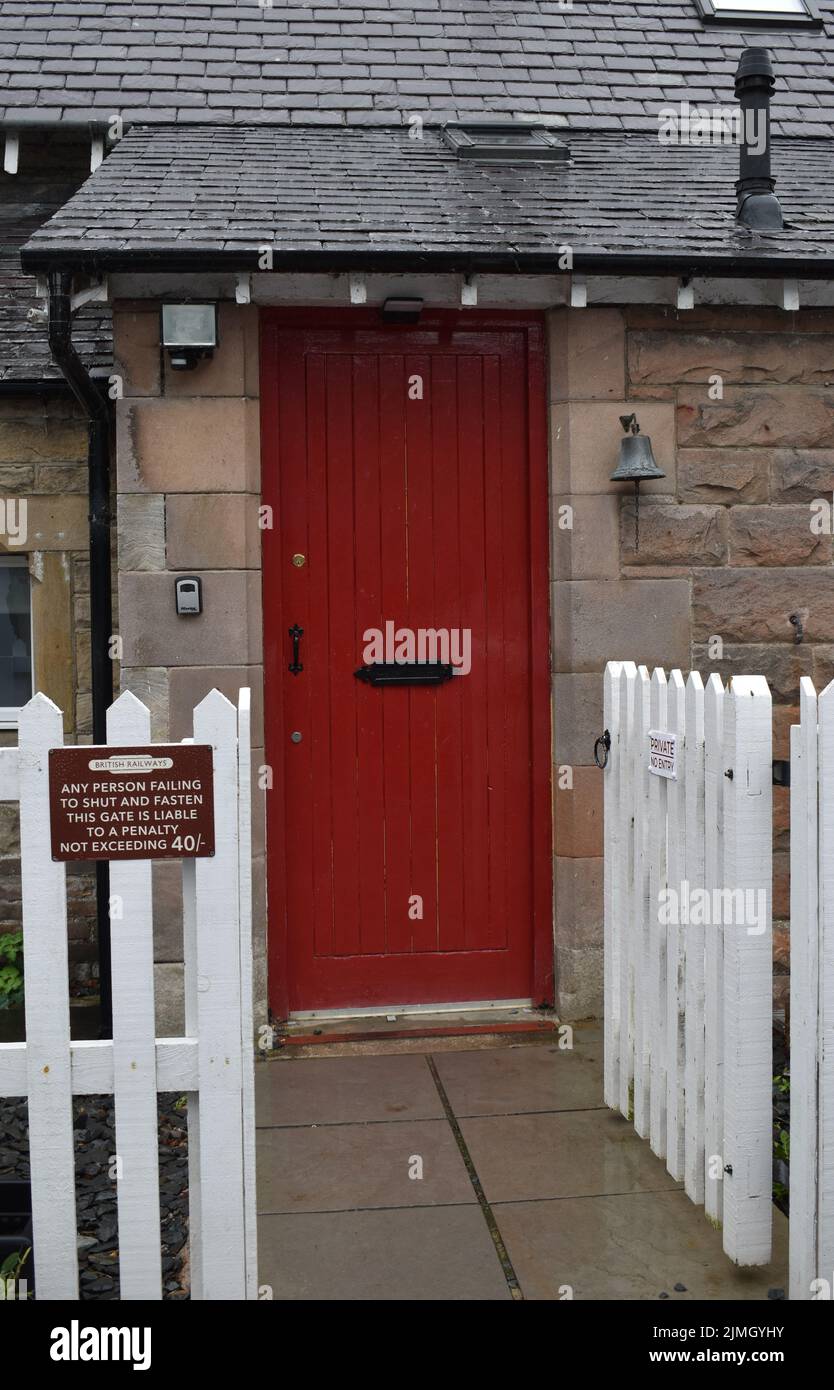 Notice: British Railways. 'Any person failing to shut and fasten this gate is liable to a penalty not exceeding 40/-' with copy space. Stock Photo