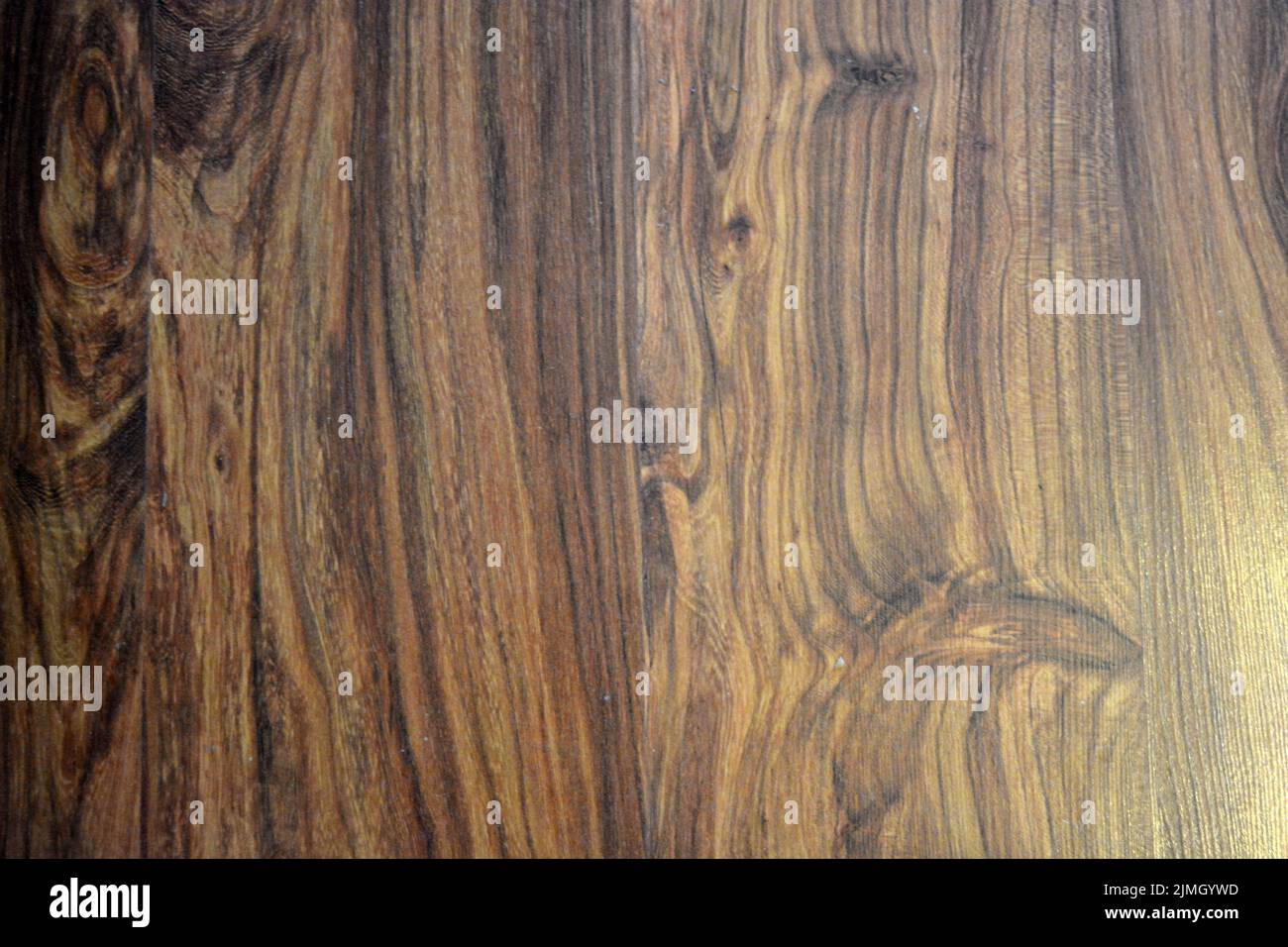 Interesting and intriguing wooden background with an pattern, textured lines. Stock Photo