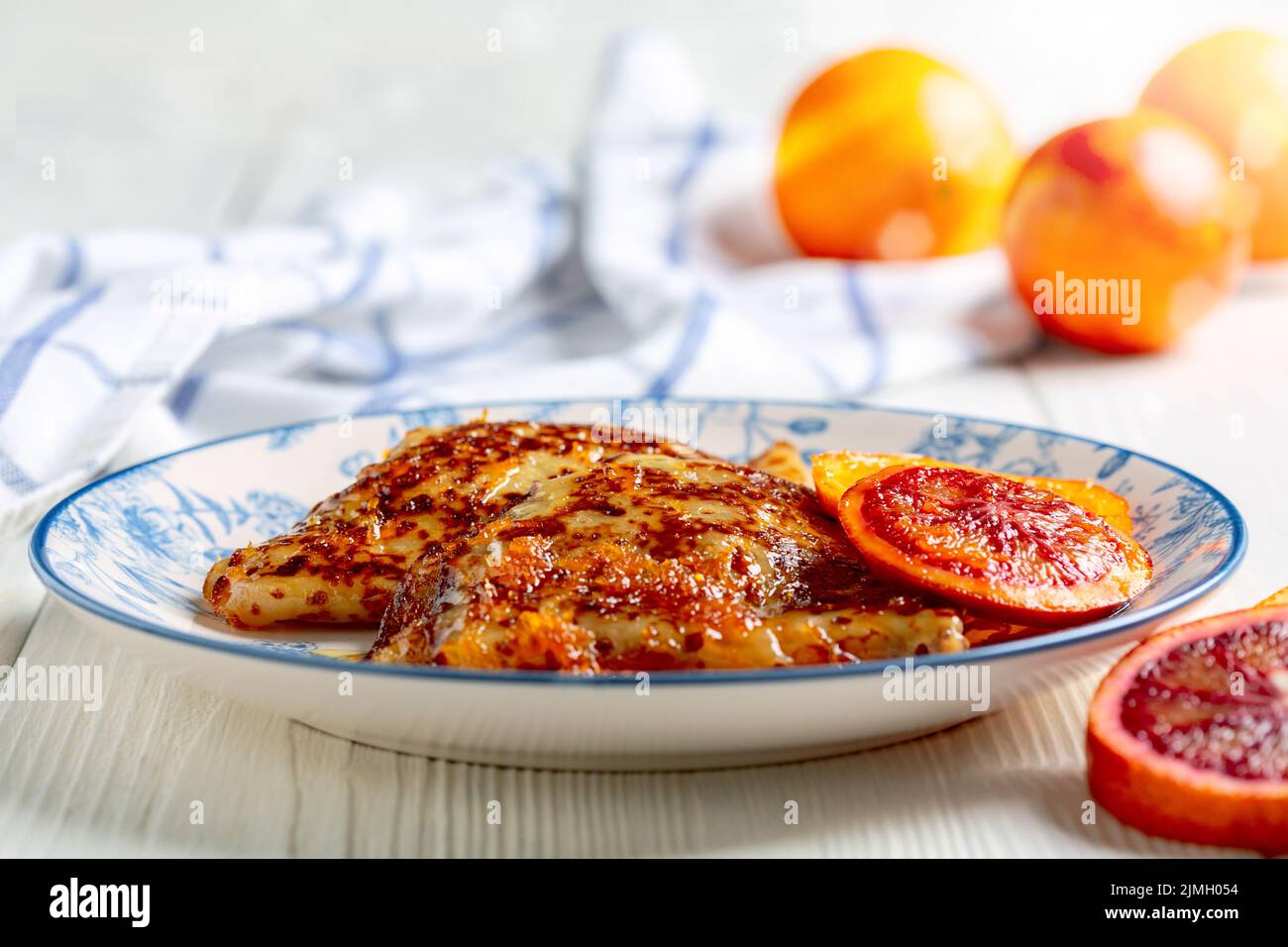Homemade French pancakes with orange sauce. Stock Photo