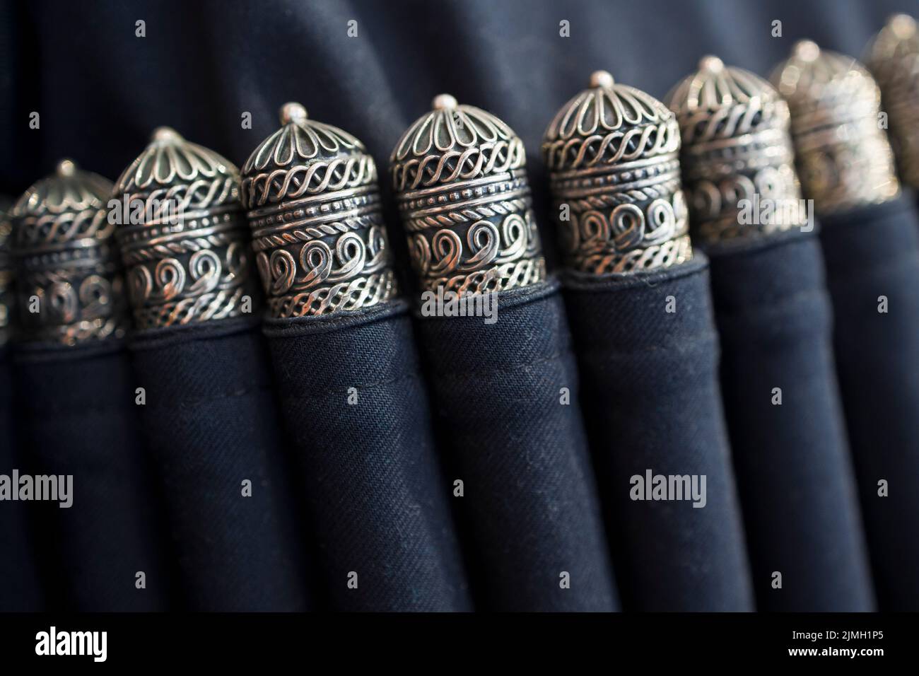Gazyr is pocket for cartridge on man dress of Caucasian people.   Decorative element on clothes Stock Photo