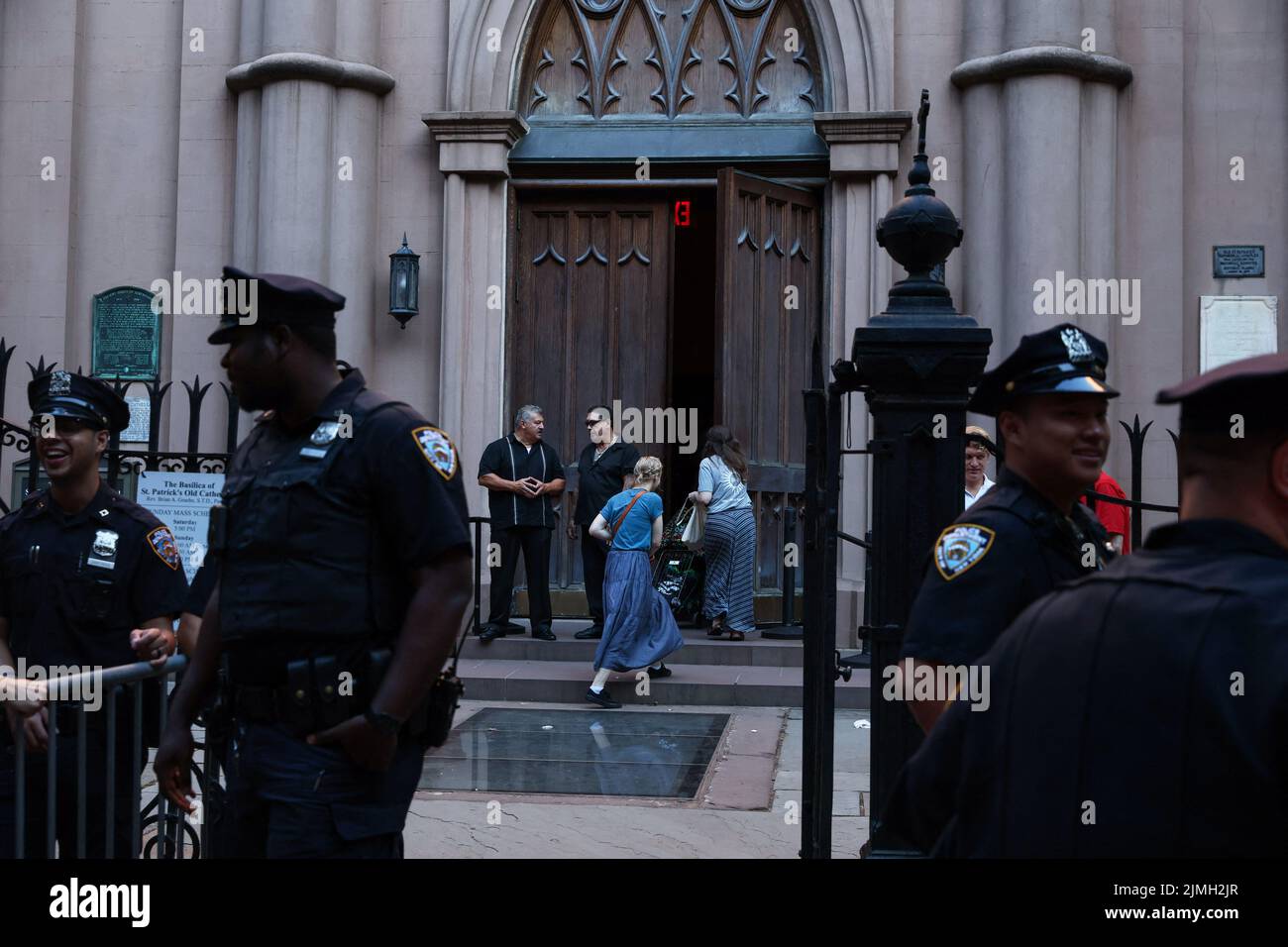 People enter St. Patrick's Old Cathedral as abortion rights activists march outside in New York City, U.S., August 6, 2022. REUTERS/Shannon Stapleton Stock Photo