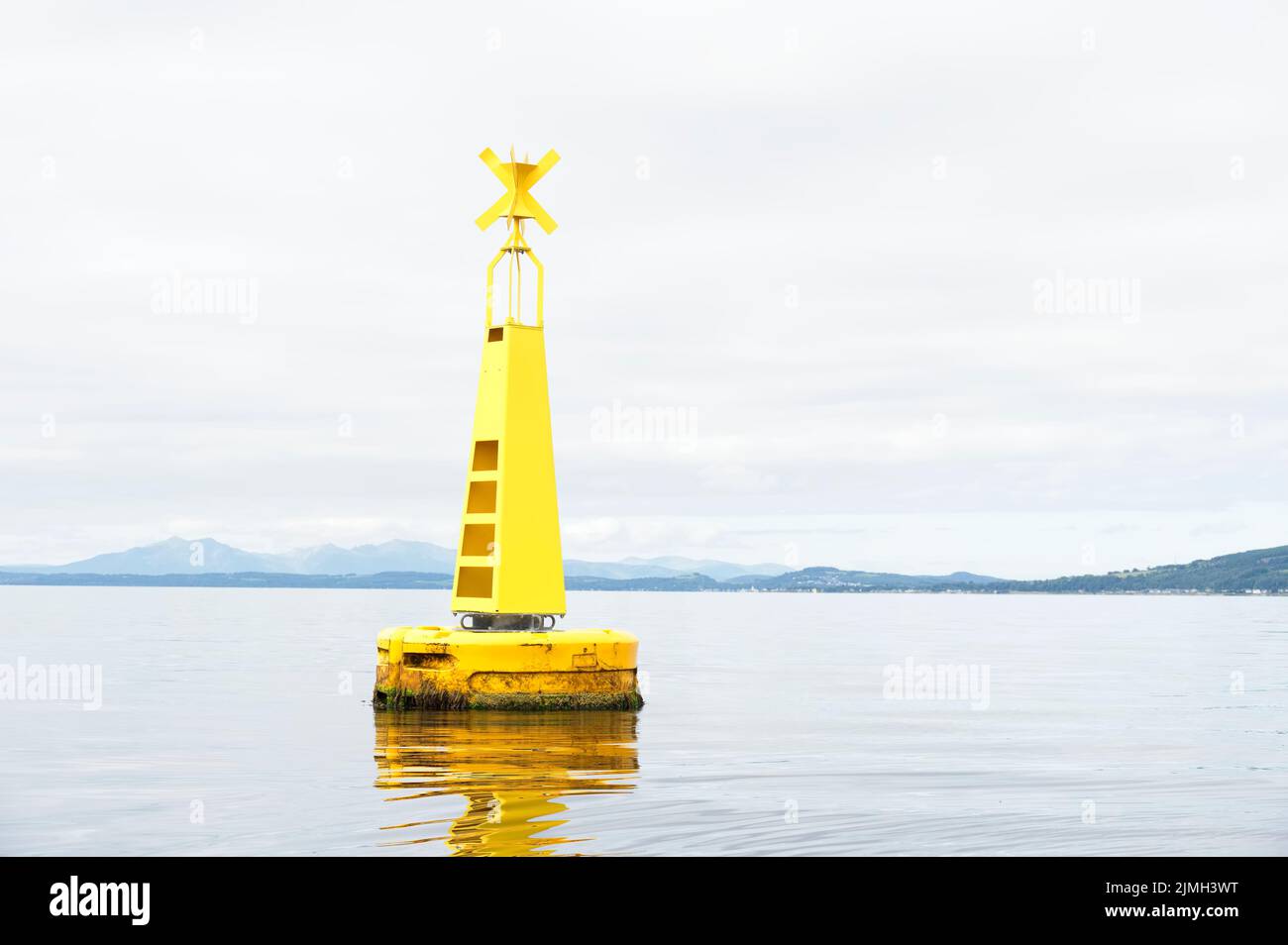 Buoy floating in Firth of Clyde for water depth warning Stock Photo