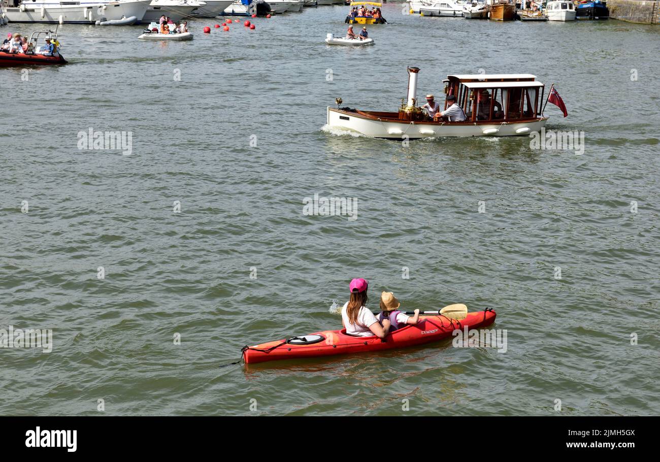 Hot sunny day with steam yacht and other small boats in Bristol floating harbour during festival Stock Photo