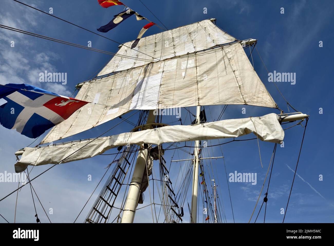 White square rig sail of tall ship Stock Photo