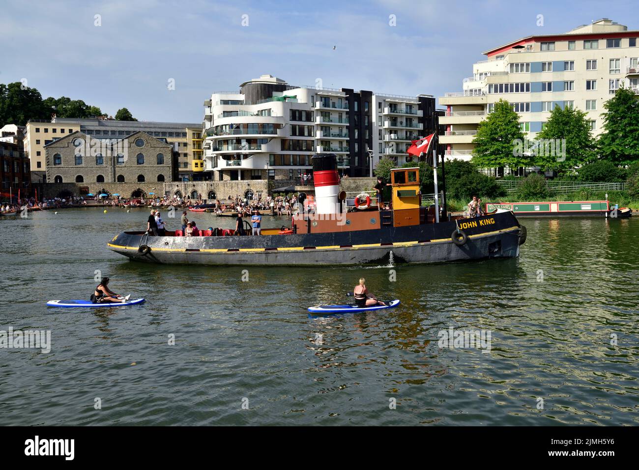 Historic Bristol built (1935 by Charles Hill & Sons Ltd.) steel hulled tug boat John King underway in Bristol bloating harbour during festival Stock Photo