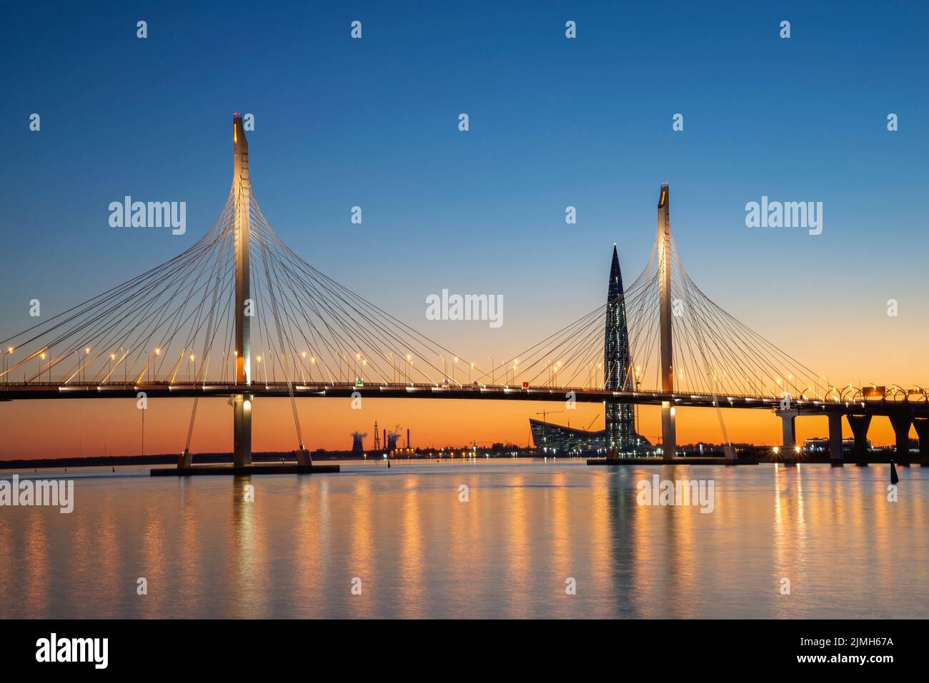 SAINT PETERSBURG, RUSSIA - MAY 29, 2018: Cable-stayed bridge and the Lakhta Center building against the sunset. Saint Petersburg Stock Photo