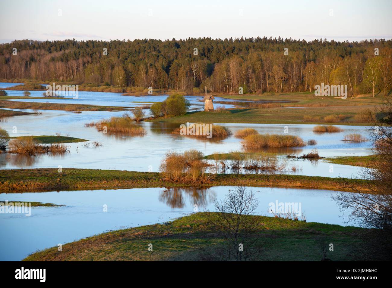 The spring flood of the Sorot River in the sunset light. Mikhailovskoye, Pskov region. Russia Stock Photo