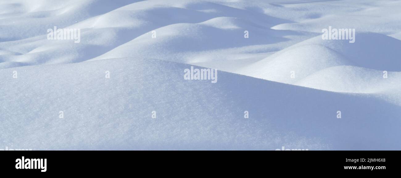 Snow wave clear surface with bumps. Natural background. Copy space, place for text Stock Photo