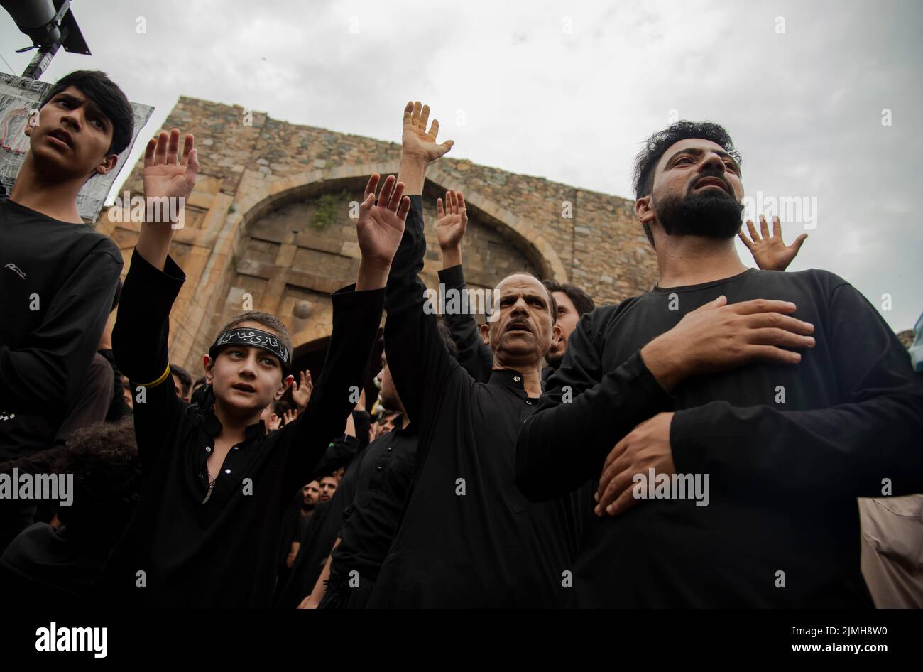 Shia Muslim mourners shout religious slogans during a procession on the ...