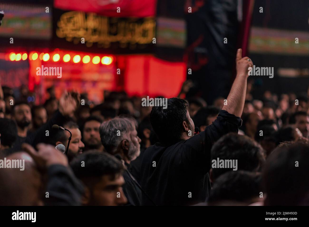 A Shia Muslim man recite religious slogans during a procession on the ...