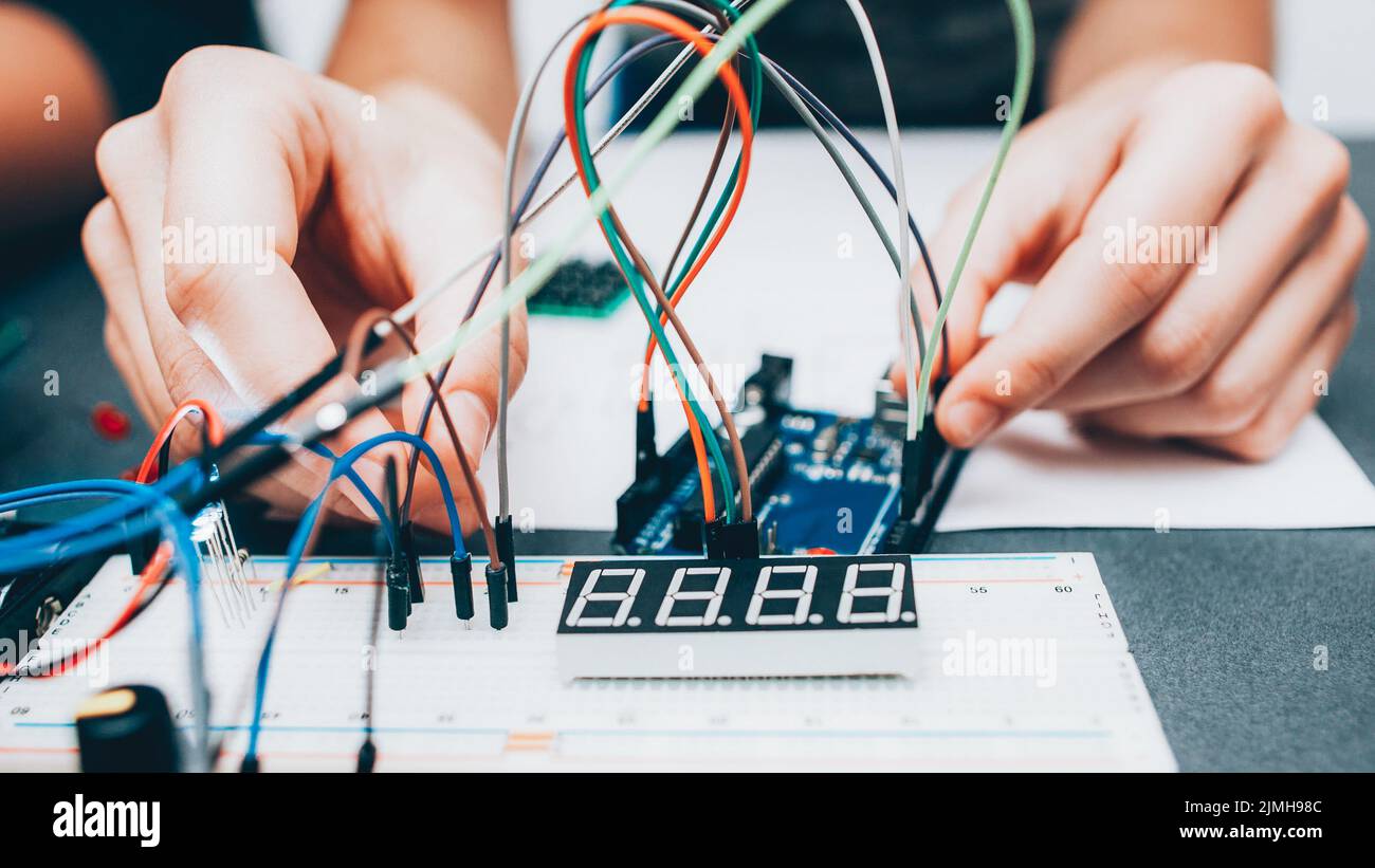 electronics experiment technician construction Stock Photo