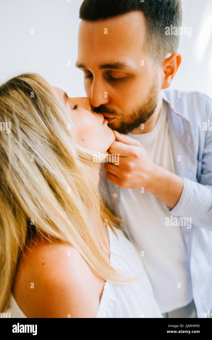 Pretty blonde kissing boyfriend hi-res stock photography and images - Alamy
