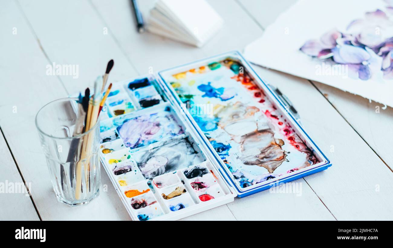 fine art school watercolor palette paintbrushes Stock Photo