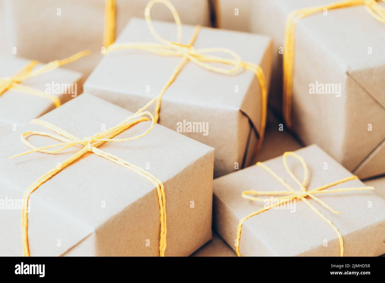 gift delivery service beige boxes yellow cord Stock Photo