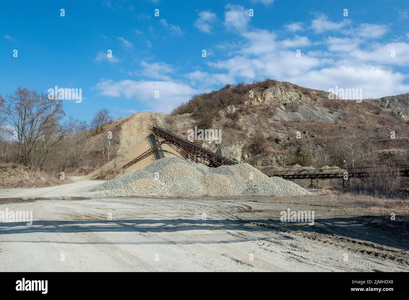 Conveyor belt at an old gravel quarry. Mining and quarrying equipment