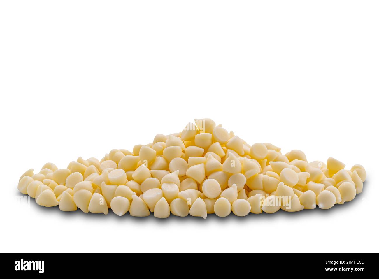Closeup view pile of white chocolate chips on white background Stock