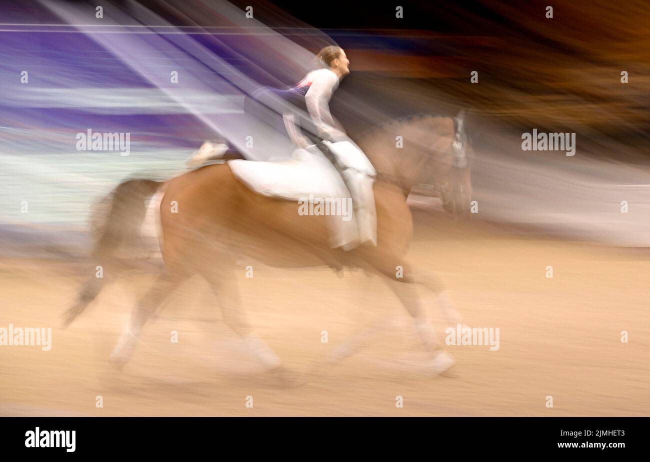 Herning, Denmark. 06th Aug, 2022. World Equestrian Games. Jyske Bank Boxen Stadium. A slow shutter speed photo of Carys Morgan (GBR) during the FEI world squad vaulting championship. Credit: Sport In Pictures/Alamy Live News Stock Photo