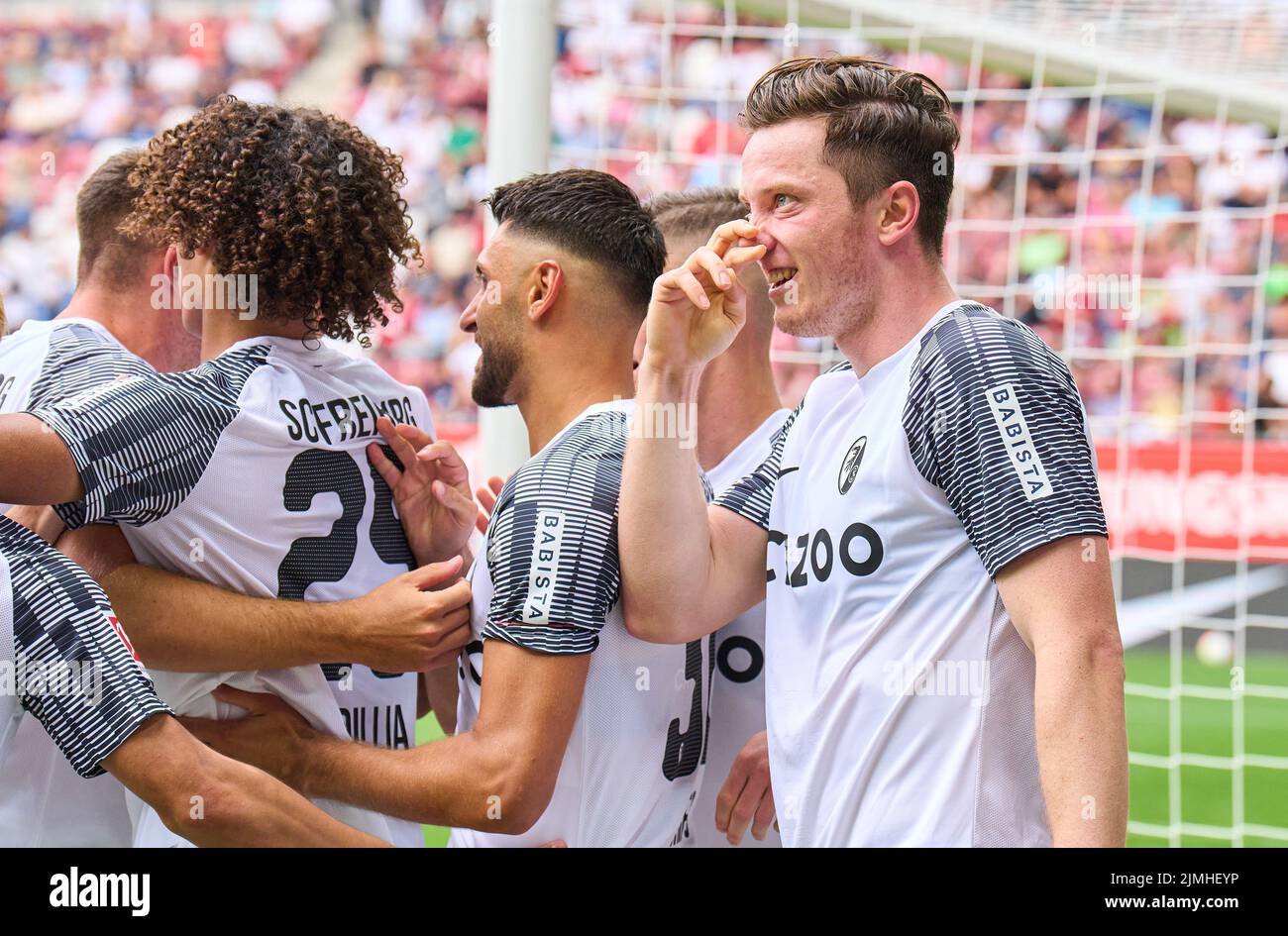 Michael Gregoritsch, FRG 38 celebrates his goal, happy, laugh, celebration, 0-1 with Kiliann Sildillia, FRG 25  in the match FC AUGSBURG - SC FREIBURG 0-4 1.German Football League on Aug 06, 2022 in Augsburg, Germany. Season 2022/2023, matchday 1, 1.Bundesliga, FCB, Munich, 1.Spieltag © Peter Schatz / Alamy Live News    - DFL REGULATIONS PROHIBIT ANY USE OF PHOTOGRAPHS as IMAGE SEQUENCES and/or QUASI-VIDEO - Stock Photo