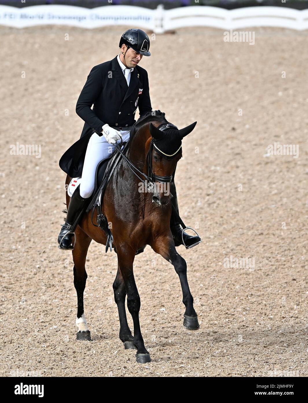 Herning, Denmark. 06th Aug, 2022. World Equestrian Games. Jyske Bank Boxen Stadium. Christian Schumach (AUT) riding DONNA KARACHO during the Blue Hors FEI world dressage team championship grand prix. Credit: Sport In Pictures/Alamy Live News Stock Photo