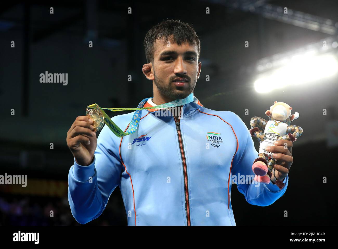 India's Naveen Naveen celebrates winning gold in the Men's Freestyle 74kg Gold Medal Match at the Coventry Arena on day nine of the 2022 Commonwealth Games. Picture date: Saturday August 6, 2022. Stock Photo