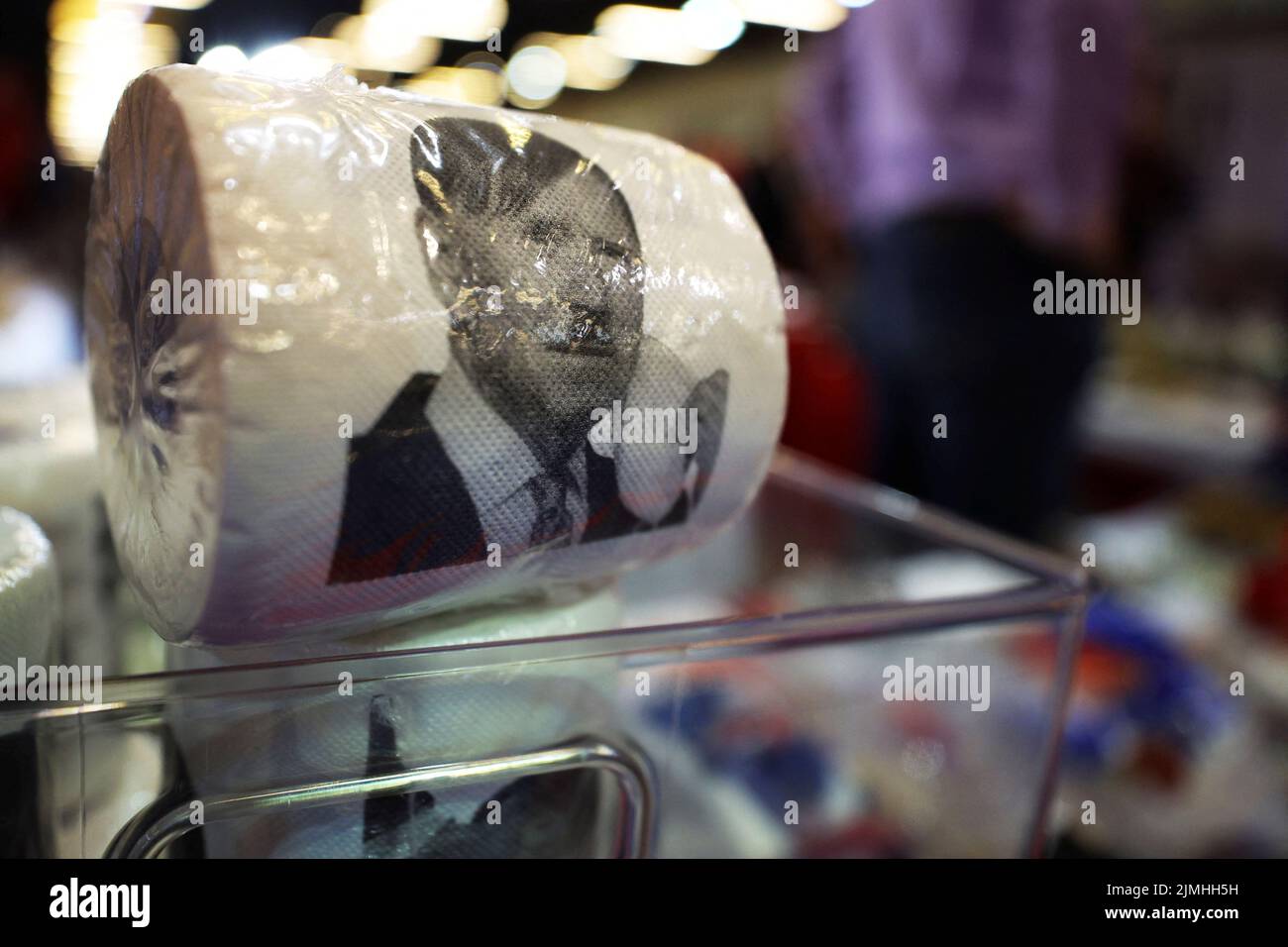 Toilet paper rolls depicting U.S. President Joe Biden as Adolf Hitler are displayed for sale at the Conservative Political Action Conference (CPAC) in Dallas, Texas, U.S., August 6, 2022.  REUTERS/Brian Snyder Stock Photo