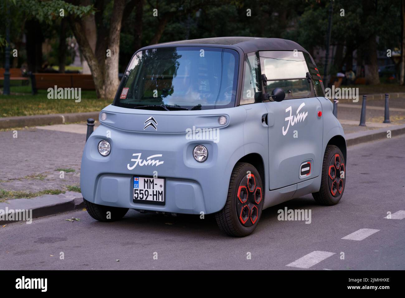 Electric Citroen Ami micro car zero emission parked. Modern 2-passenger ...