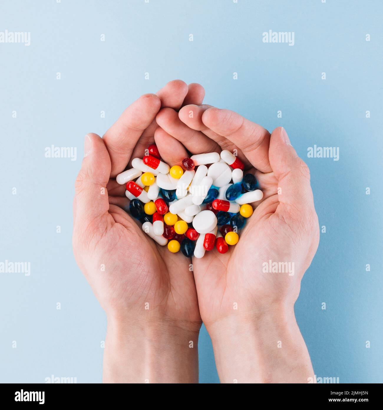 Various pills hand Stock Photo Alamy
