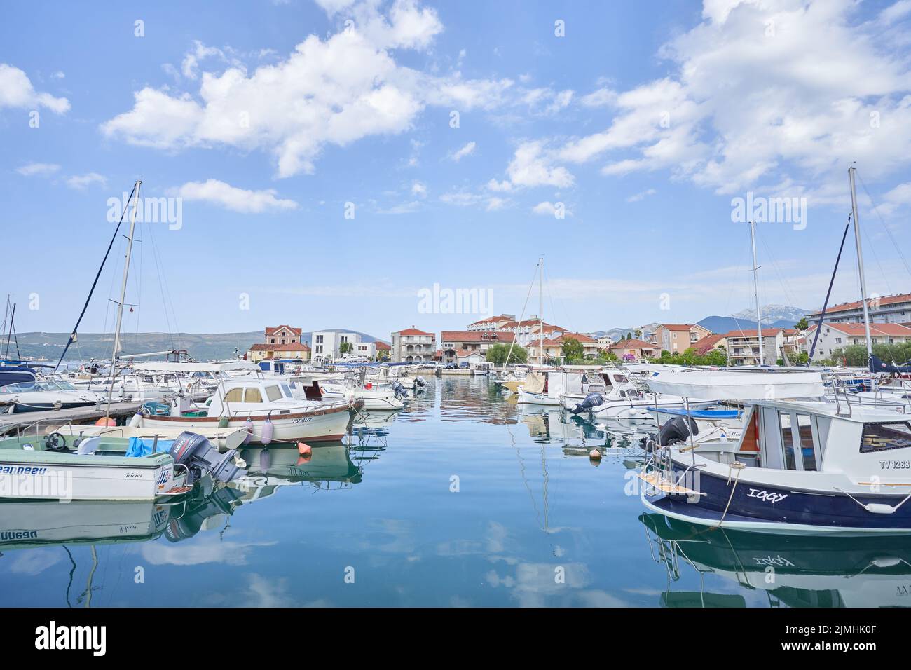 Small boats and pleasure boats in the dock Stock Photo