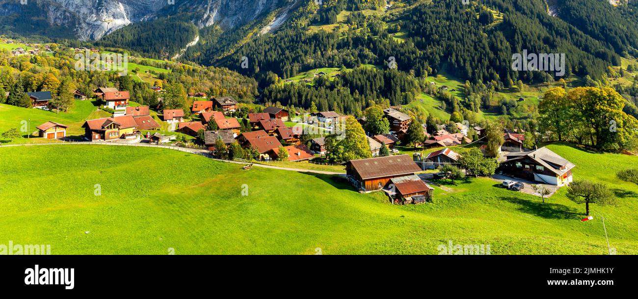 Switzerland mountains, wooden houses in Grindelwald in Swiss Alps Stock Photo