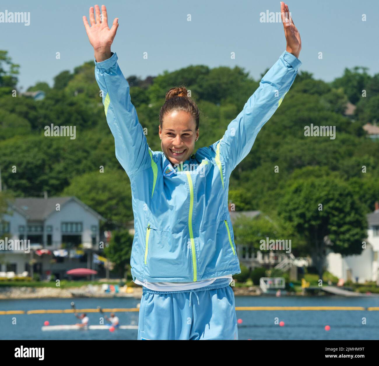 Dartmouth, Canada. August 6th, 2022. Gold Medalists and World Champion Liudmyla Luzan from Ukraine receives her medal in the C1 Women 1000m event which she won in strong fashion winning by 2.12 seconds over the Chilian rower. The 2022 ICF Canoe Sprint and Paracanoe World Championships takes place on Lake Banook in Dartmouth (Halifax). Credit: meanderingemu/Alamy Live News Stock Photo