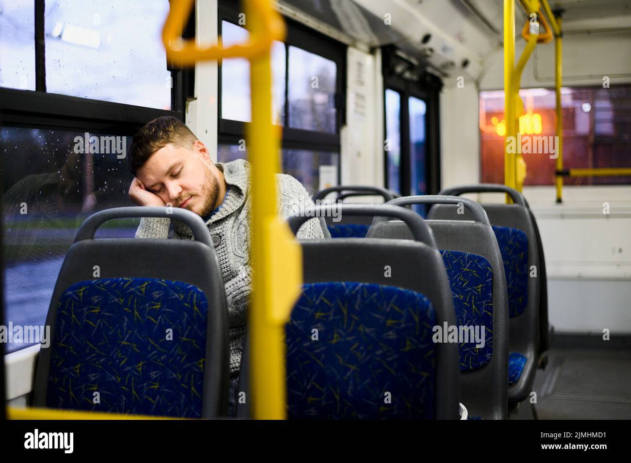 Young man sleeping bus seat Stock Photo Alamy