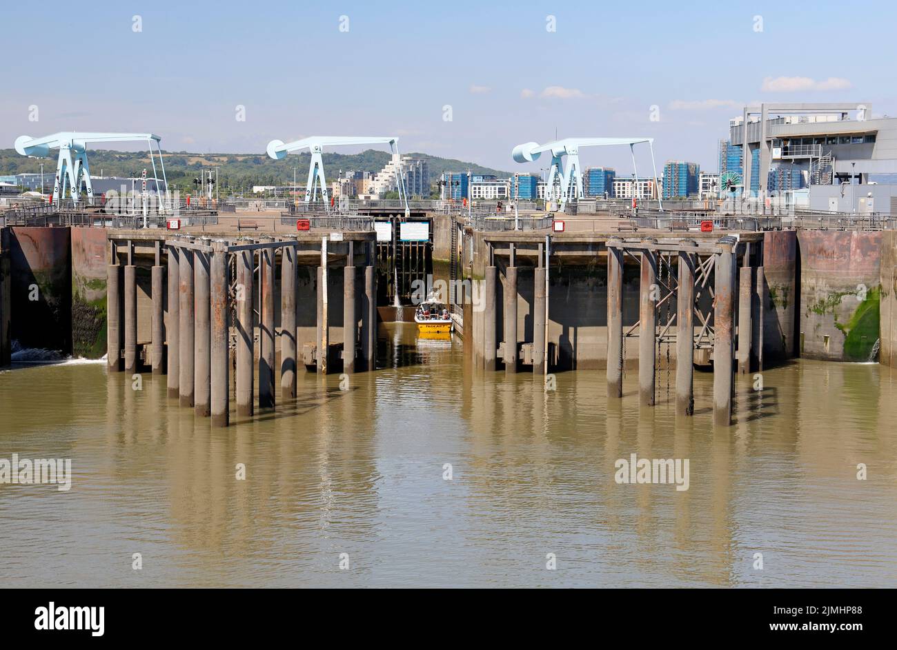 Boat waiting at Cardiff Harbour lock gates for entry into Cardiff Bay