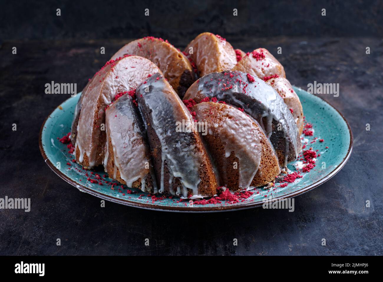 Traditional exotically bundt marble cocoa chocolate cake with icing