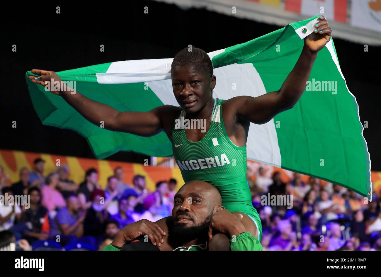 Nigeria’s Miesinnei Genesis celebrates after competing against Canada’s Madison Parks in the Women’s 50kg Gold Medal match at the Coventry Arena on day nine of the 2022 Commonwealth Games. Picture date: Saturday August 6, 2022. Stock Photo