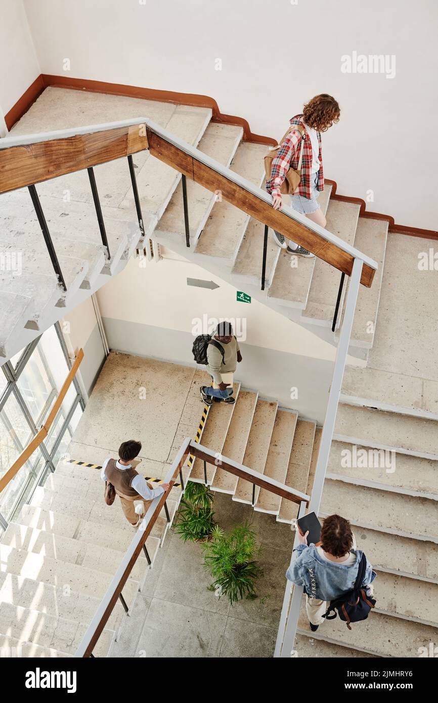 Above angle of multicultural teenage students of highschool moving